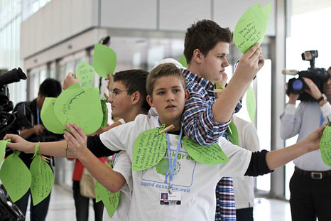 An action taking place at COP18 in Doha (Pic: theverb.org/Flickr)