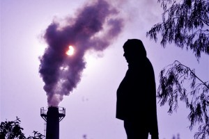 Smoke rises from a chimney of a garbage processing plant on the outskirts of Chandigarh