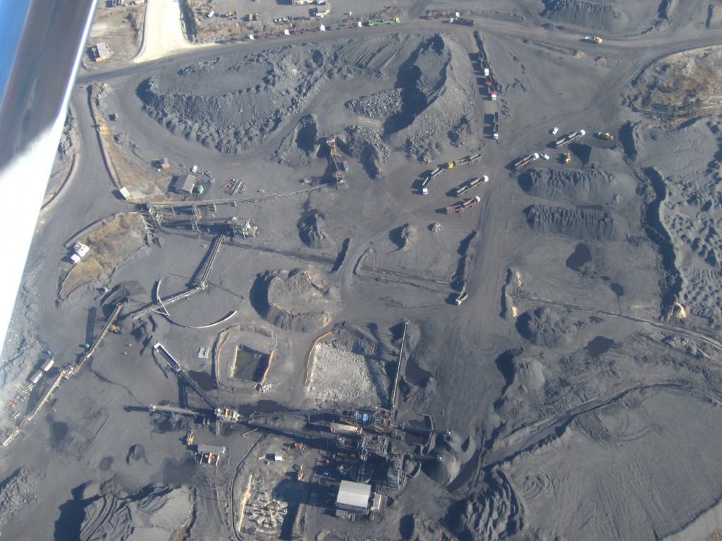 Energy production through opencast coal mining and coal-fired power stations has transformed the landscape on the Mpumalanga Highveld, and filled the atmosphere with smog. Each power station emits a toxic combination of SO2, NOx, particulate matter, and other pollutants. Photo: Melissa Fourie/CER 