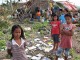 DMC/Merlin Keyword: TYPHOONHAIYAN  Please credit Pio Arce/Genesis Photos
Gelian dela Cruz (11) is worried that her school is ruined. She was even excited to do an oral recitation the day when the storm struck their town in Barangay Libertad, Bogo City, Cebu. The full scale of the disaster caused by Typhoon Haiyan in the Philippines is only now becoming apparent.